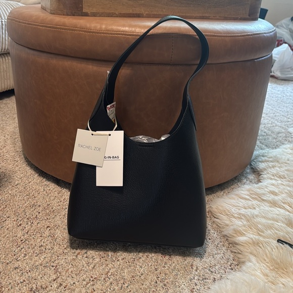 Rachel Zoe Handbags - Rachel Zoe. Black leather bag. Extra compartment bag inside, shown in picture.